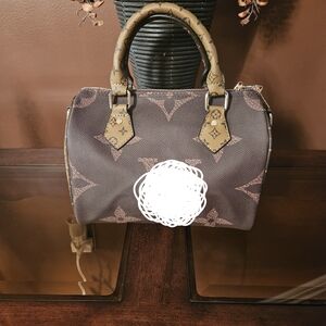 Chic Brown Satchel with Patterned Handles
